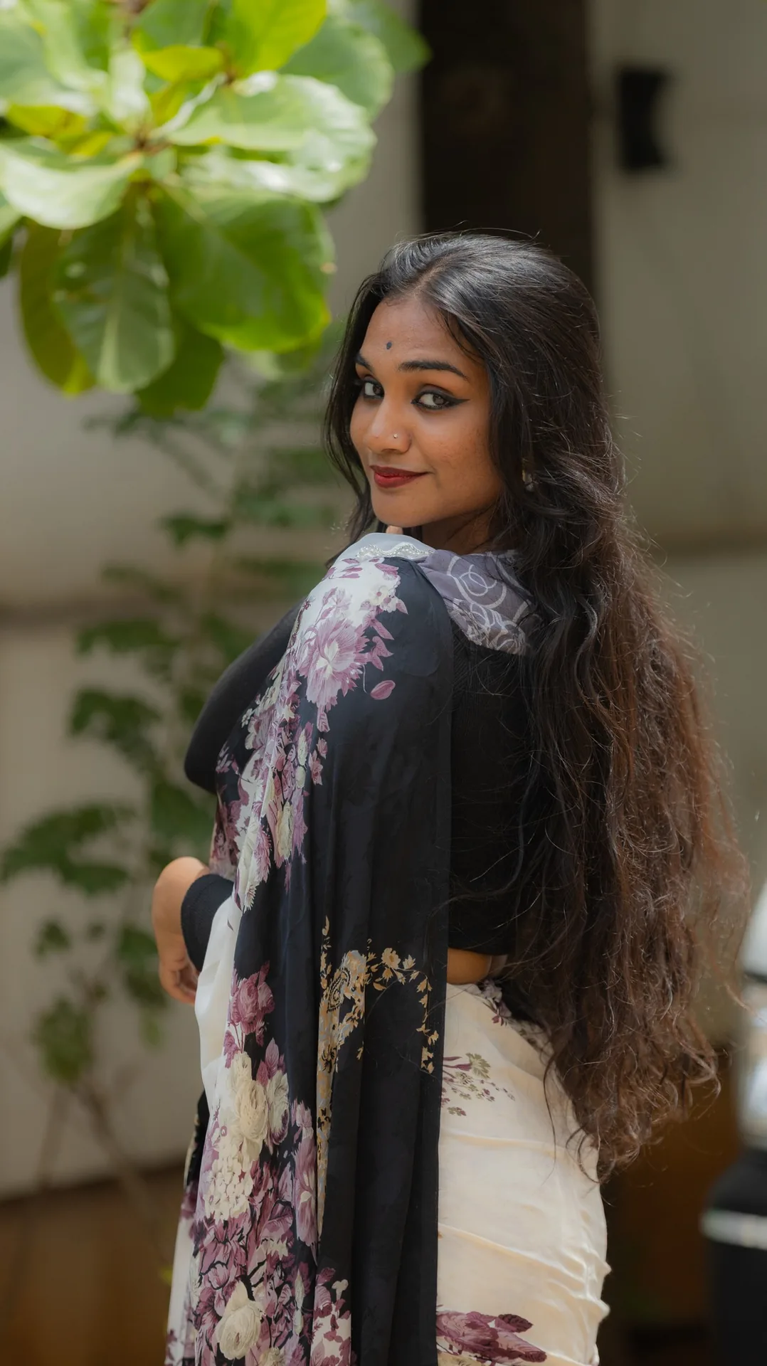 Portrait in floral saree